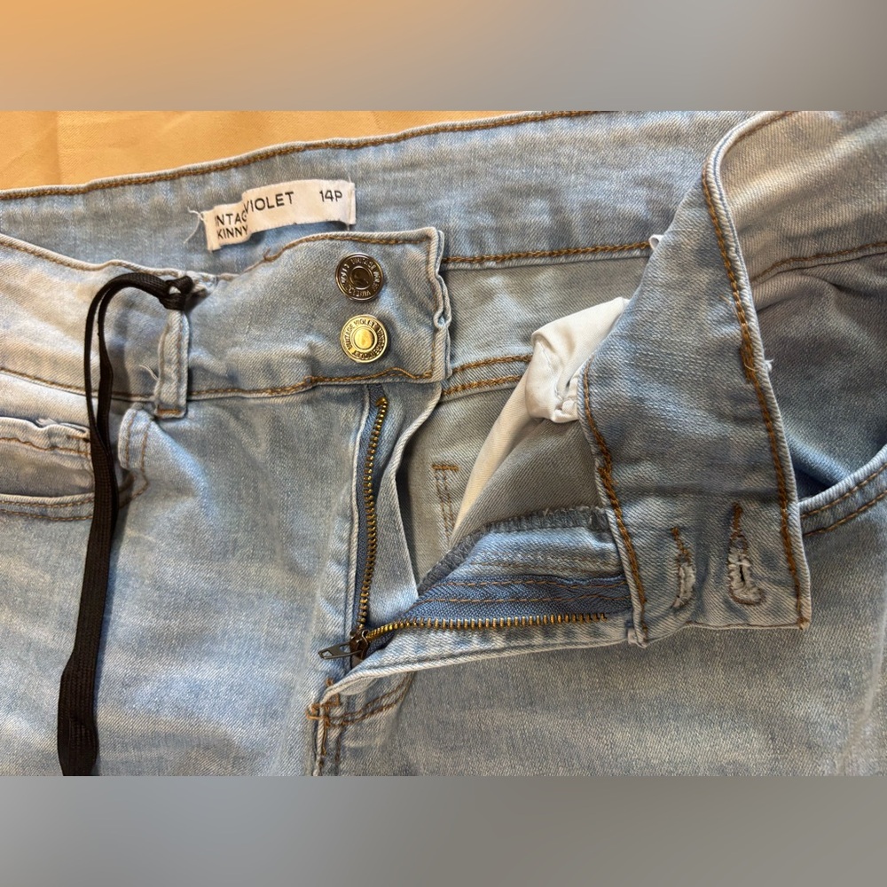 Women's Light Blue Distressed Skinny Jeans with Studded Details - Picture 11 of 15